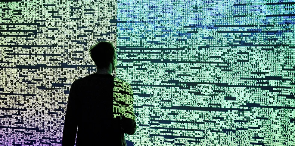 A visitor seen looking at the Multimedia project Data Flux (12 XGA version) by Japanese artist Ryoji Ikeda at the Onassis Cultural Center in Athens.