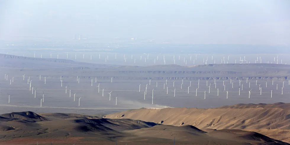 Hundreds of wind turbines sit in the Turfan Depression in China's northwestern Xinjiang