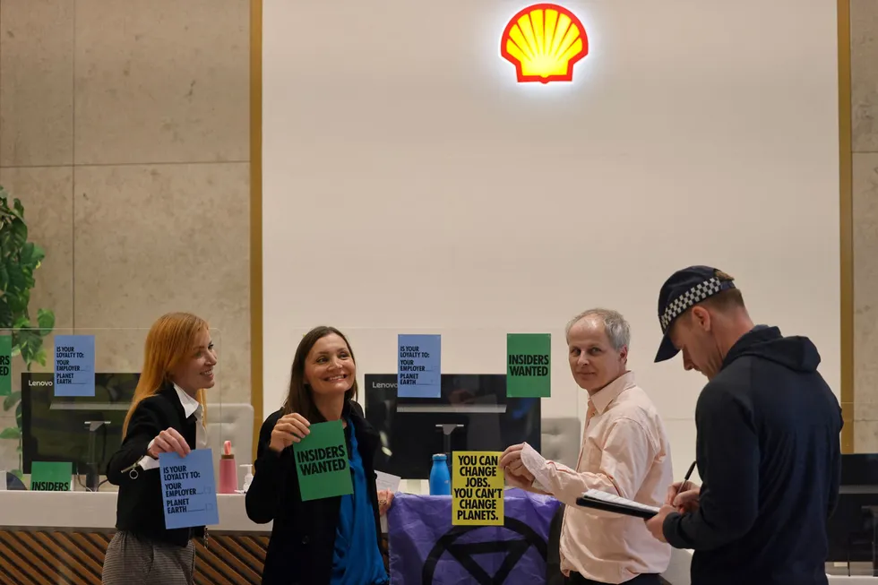 Shell protest: In this file image, activists from climate change protest group Extinction Rebellion (XR), with their hands glued to the reception desk, demonstrate at the Royal Dutch Shell headquarters in London during April 2022.