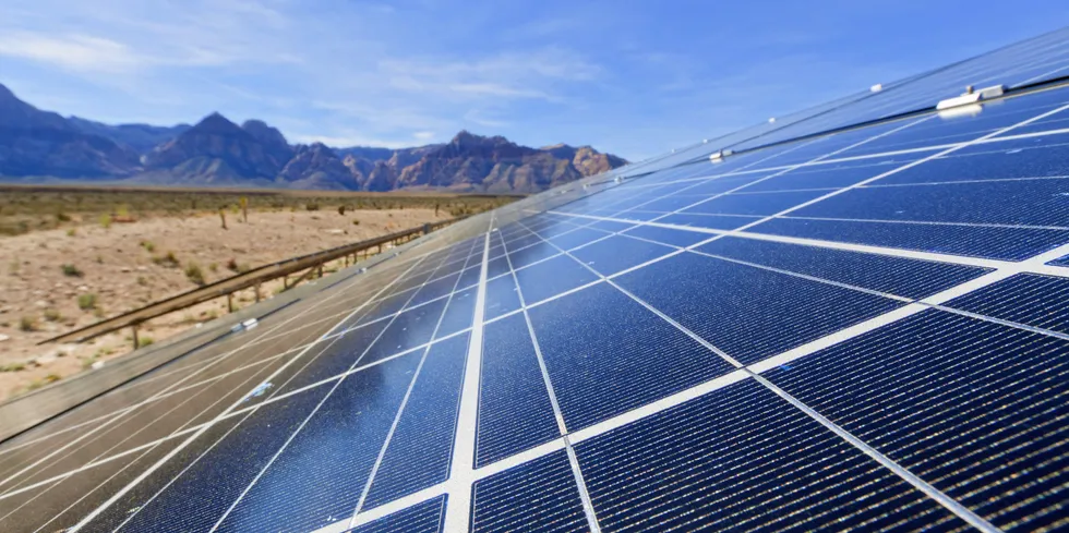 View of solar panels in the Mojave Desert. . US solar.