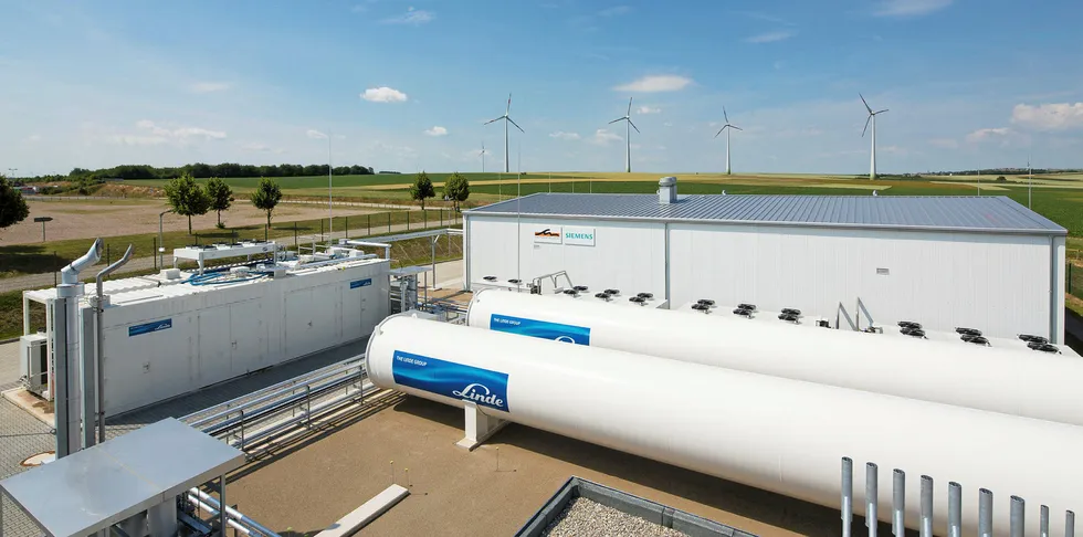 The Energiepark Mainz projects converts surplus electricity from wind farms to hydrogen. The picture shows the electrolysis hall with heat exchangers, hydrogen tanks and compressor containers.