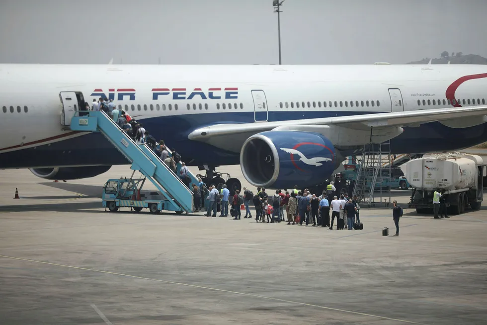 Covid-19 threat: Nigerian carrier Air Peace loading passengers at Abuja international airport