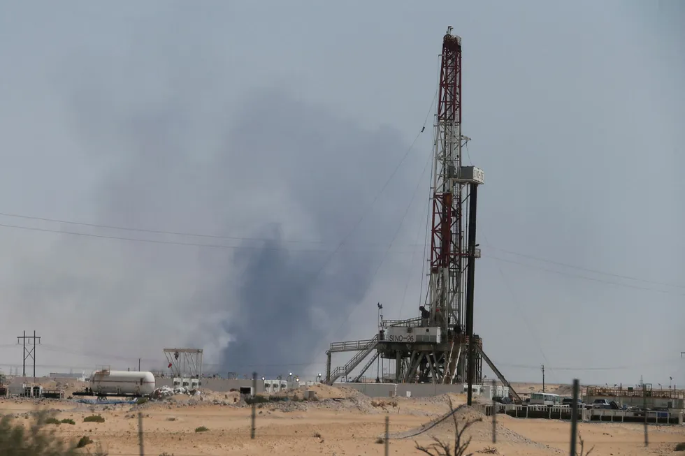 Hitting global prices: smoke is seen following a fire at Aramco facility in the eastern city of Abqaiq, Saudi Arabia, over the weekend