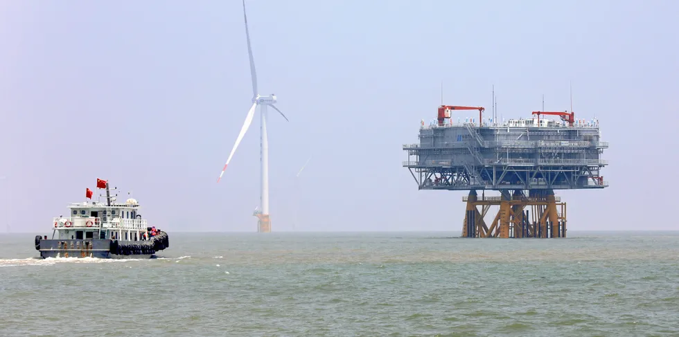 A view of an offshore platform hosting a 220kV transformer for a new wind farm about 39 kilometers away from the shore in Rudong county in east China's Jiangsu province Monday, May 24, 2021.