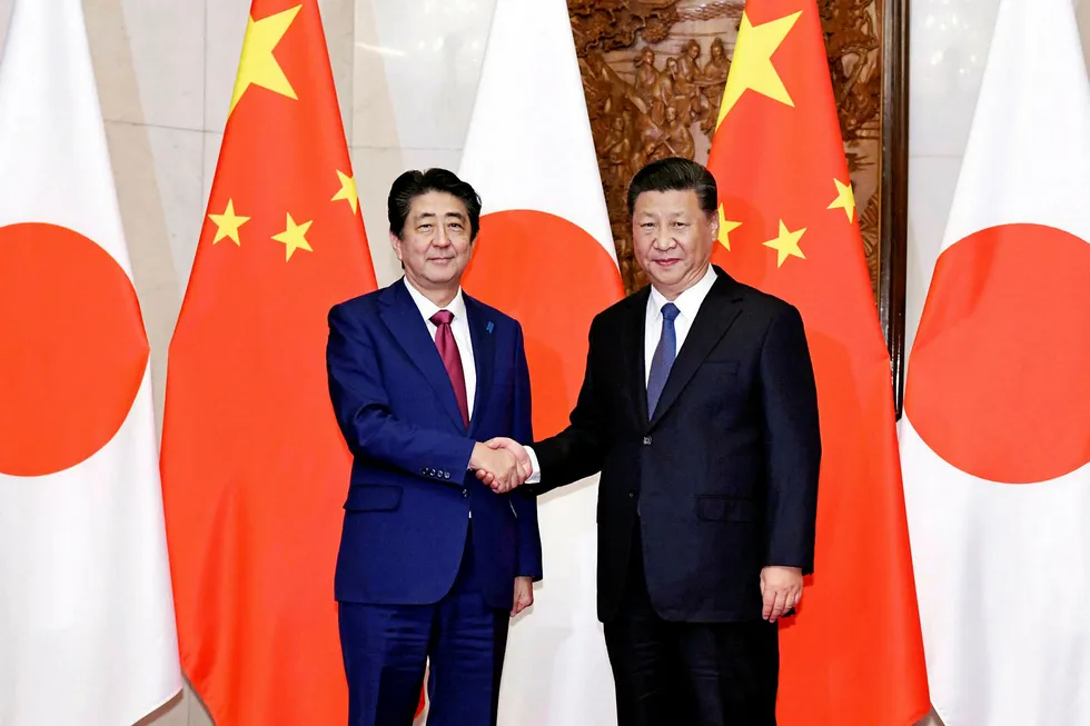 Turning point: Japanese Prime Minister Shinzo Abe (left) with Chinese President Xi Jinping