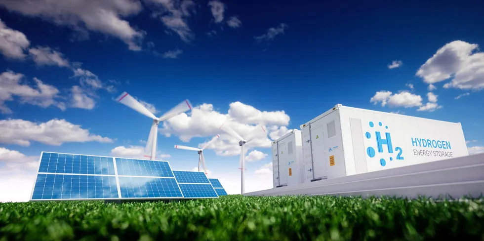 A graphic showing wind- and solar-powered green hydrogen energy storage.