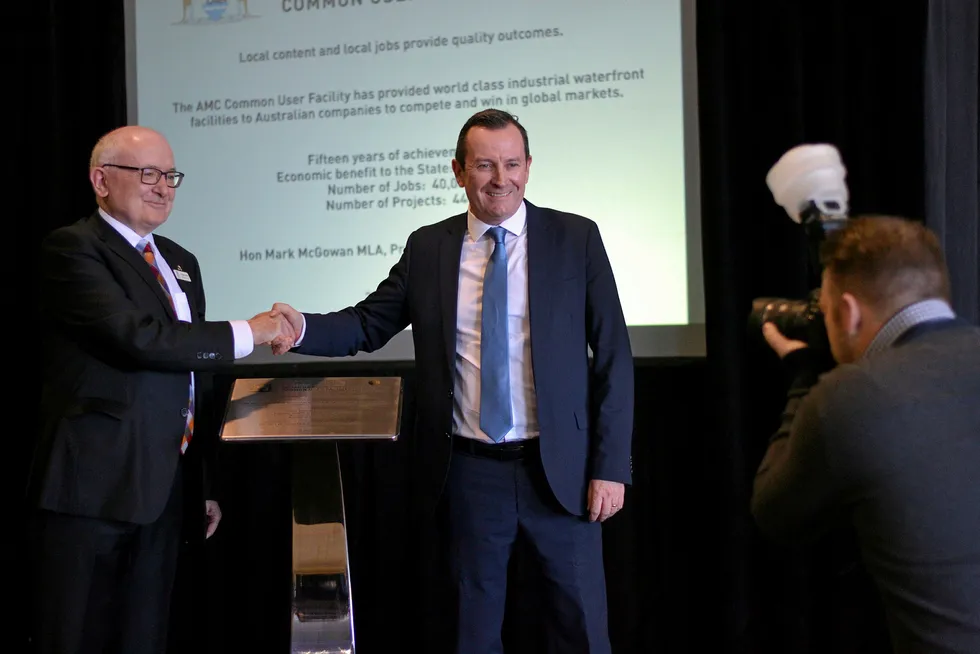 Milestone: AMC general manager Jonathan Smith (left) and WA Premier Mark McGowan commemorate 15 years of operations at the common user facility