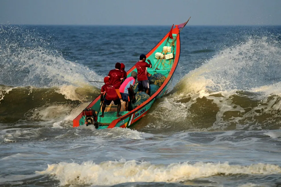 Setting out: Indian fishermen sail into the sea in the Bay Of Bengal
