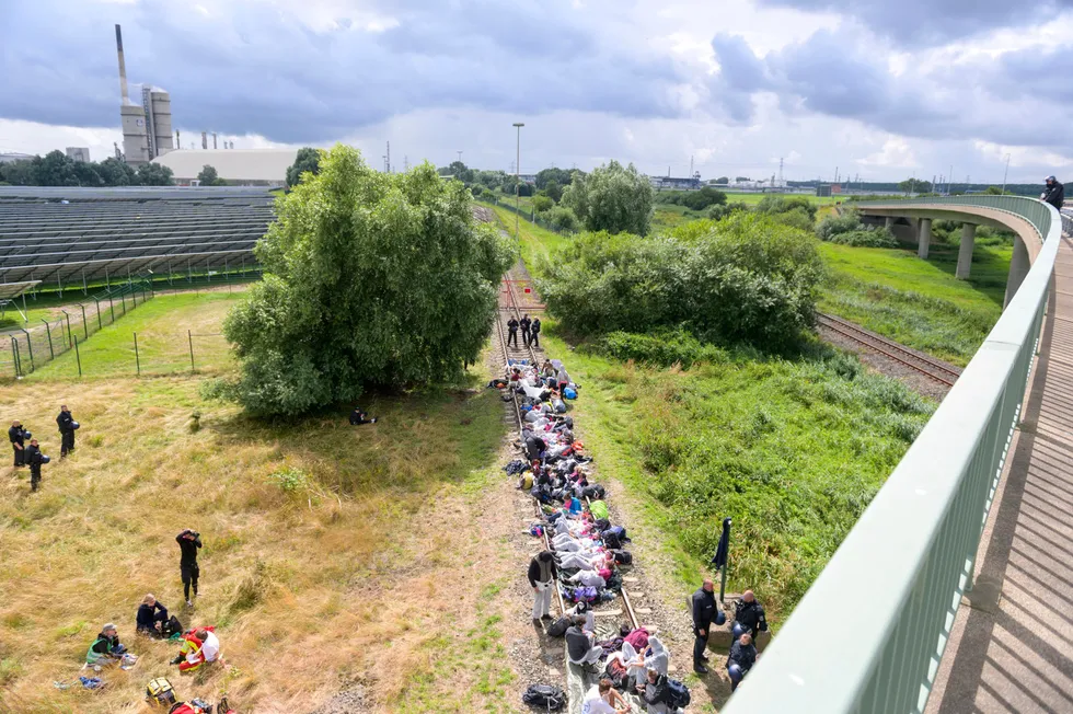 Change of sight: Activists occupy a rail track in Brunsbuttle in Germany in July 2021 where they had gathered to protest the planned liquefied natural gas terminal
