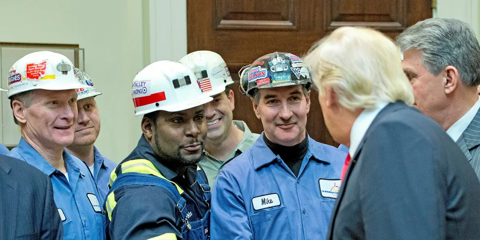 Donald Trump may have invited coal miners to speak at the White House, but the President's impact on US renewables has been far less harsh than feared. Pic: Pool/Getty Images