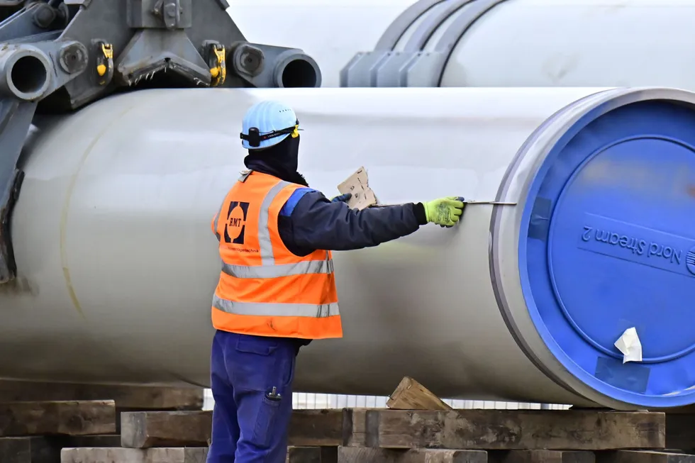 Firing ahead: a man working at the onshore construction site at the Nord Stream 2's gas pipeline exit point in Lubmin, Germany