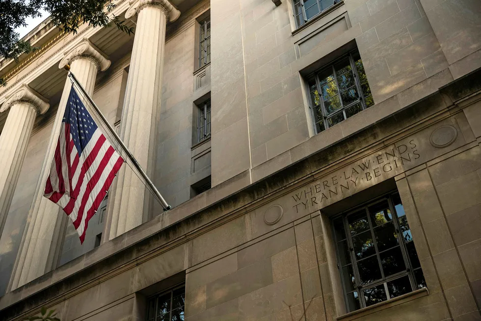Centre point: the US national flag flies outside the Department of Justice in Washington, DC