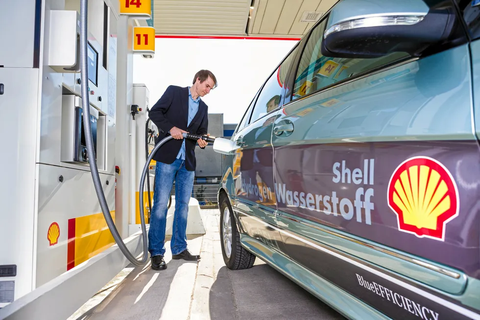 Clean fuel: A hydrogen-powered vehicle being filled up at a Shell garage in Germany ('Wasserstoff' is the German word for 'hydrogen').