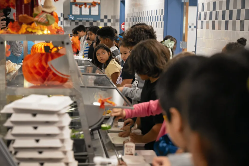 The USDA procures pollock for programs that include its national school lunch program. Pictured above: Children get in line to get their lunch at Annandale Terrace Elementary School in Annandale, VA, Oct. 11, 2023.