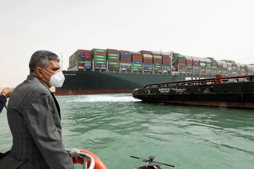 The head of the Suez Canal Authority, Lt. Gen Ossama Rabei, with the Evergreen containership Ever Given, owned by Shoei Kisen, in the distance. The vessel ran aground in the Suez Canal March 23.