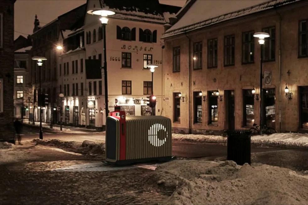 Autonome brev- og pakkeautomater kan i egnede områder erstatte postkassen. Automaten kjører selv tilbake på kveld/natt for å bli fylt med morgendagens leveranser. Her ved Christiania torv i Oslo. Foto: Leif Skandsen/Posten