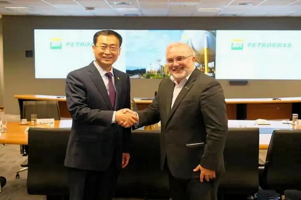 Handshake: Petrobras chief executive Jean Paul Prates (right) with Energy China president Lv Zexiang.