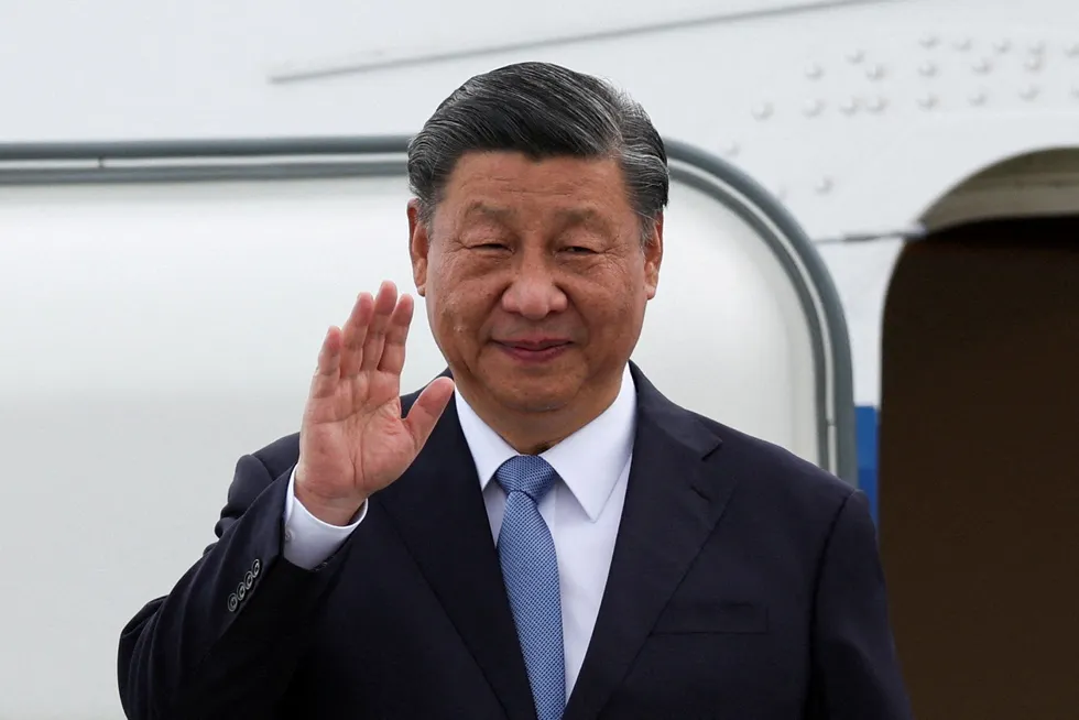 Greeting: Chinese President Xi Jinping waves as he arrives at San Francisco International Airport for key meeting with US president Joe Biden
