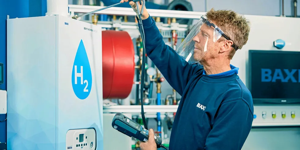 A Baxi Heating engineer working on a hydrogen boiler