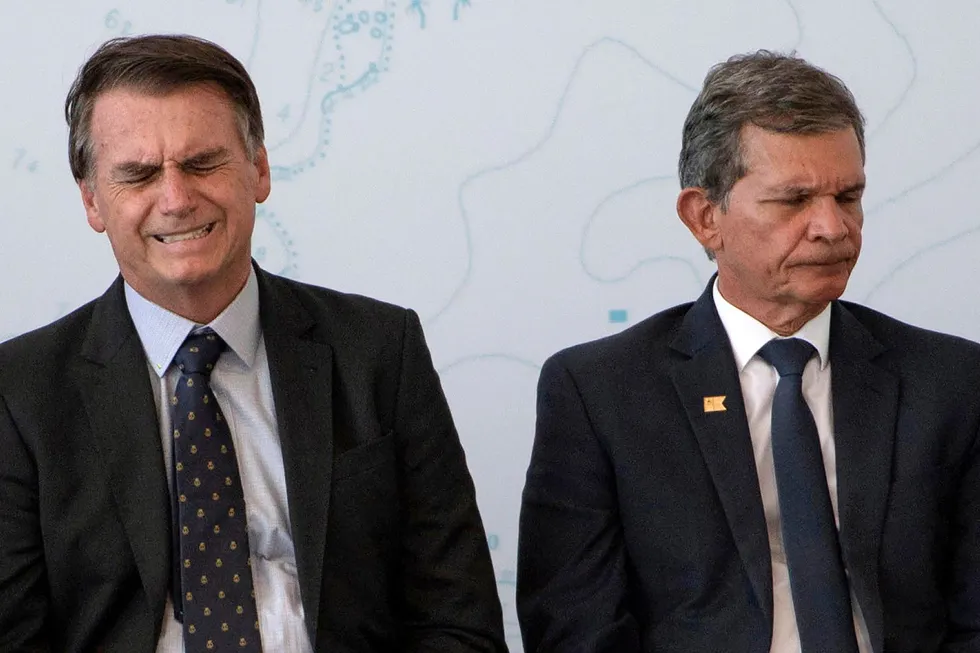 At odds: Brazilian President Jair Bolsonaro (left) and Petrobras chief executive Joaquim Silva e Luna