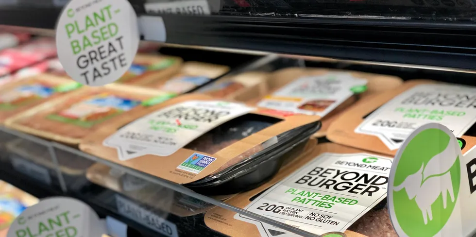 NEW YORK, USA - NOVEMBER 10, 2019: Beyond Meat plant-based burger patties and sausage products on sale inside refrigerator a grocery store in New York, USA. . beyond meat plant-based.