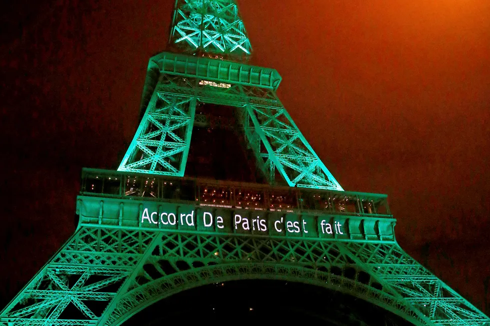 Goals: the Eiffel Tower lit up in green to mark the Paris Agreement to counter climate change