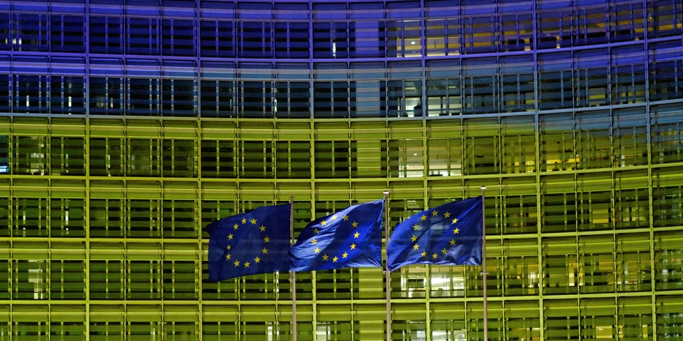 The EU Commission is lighted in blue and yellow, the colours of the Ukrainian flag.