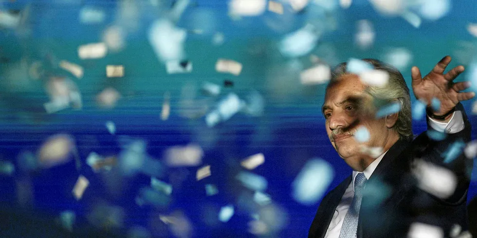 Argentina's new President Alberto Fernandez wave his supporters during the inauguration ceremony at Plaza de Mayo square in Buenos Aires on December 10, 2019.