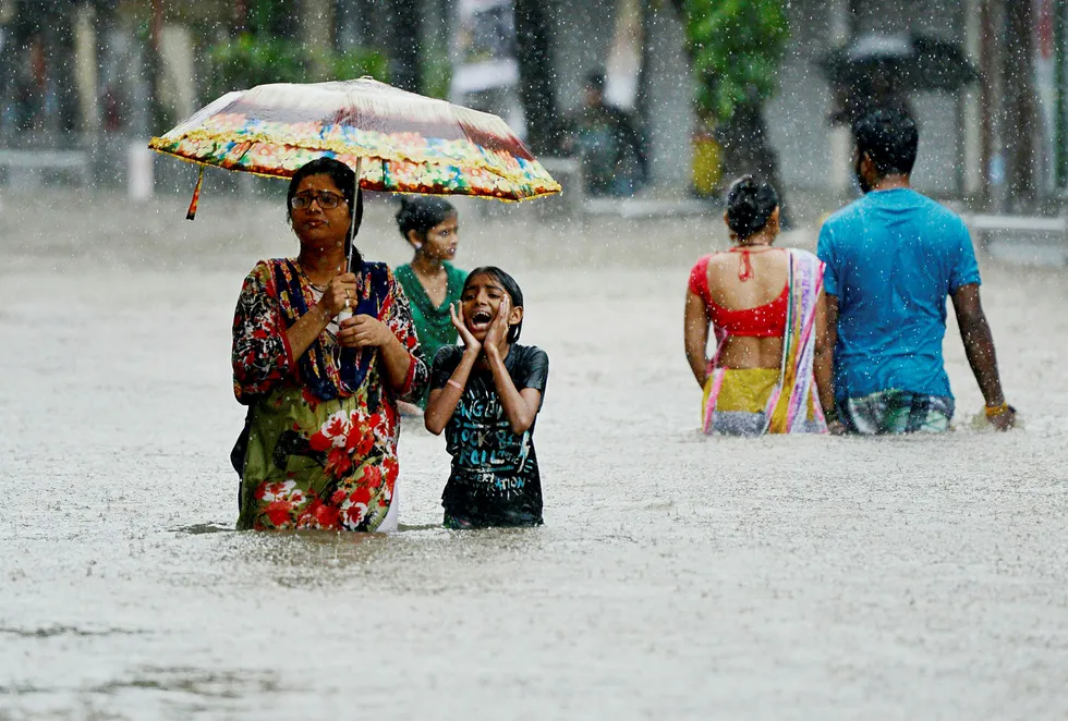 Mye regn har gitt flom i India. Foto: PUNIT PARANJPE/AFP/NTB scanpix