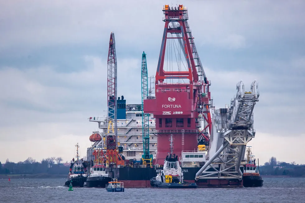 Aborted take-off: tugboats assist Russian pipe-laying vessel Fortuna in leaving the German port of Wismar on its way to the Baltic Sea on 14 January