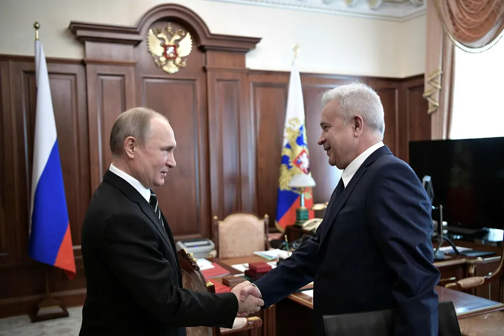 Hope for dialogue: Lukoil chief executive Vagit Alekperov (right) meets with Russian President Vladimir Putin who approved higher tax take on Russian oil producers earlier in October