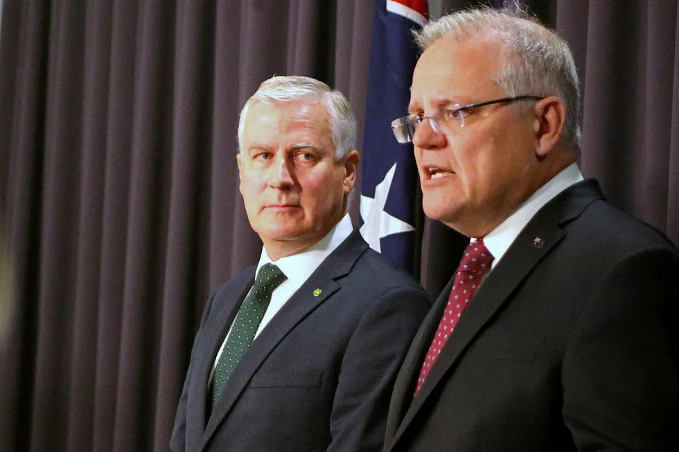 Changes: Australian Prime Minister Scott Morrison, right, and Deputy Prime Minister Michael McCormack brief the media in Canberra as Morrison announced changes to his Cabinet