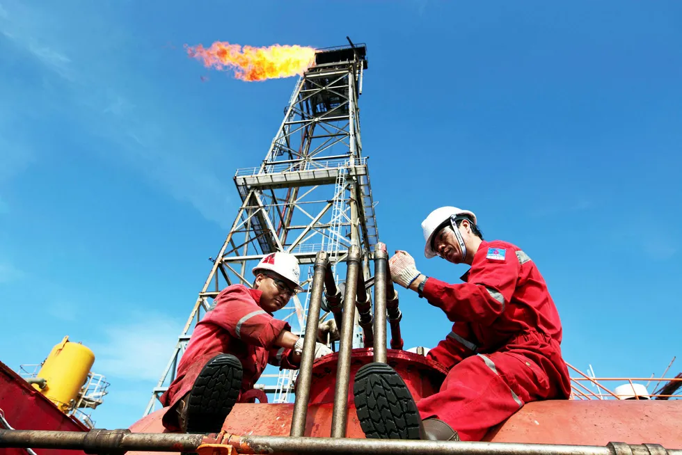 Vital interests: PetroVietnam employees on an offshore facility