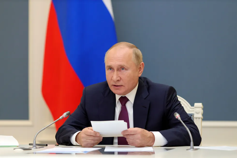 Verbal assurances: Russian President Vladimir Putin attends the G20 leaders summit via a video link in Moscow on 30 October
