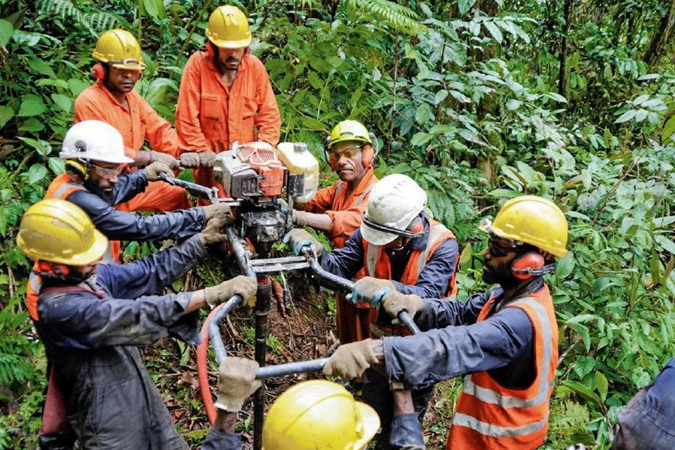 Working hard: an exploration crew in Papua New Guinea