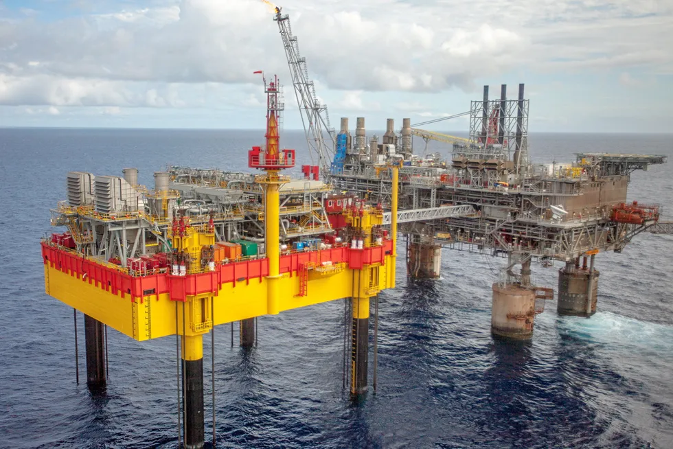 In operation: Phase three of the Malampaya project in the Philippines included a new depletion compression platform (left) bridge-linked to the existing shallow-water platform.