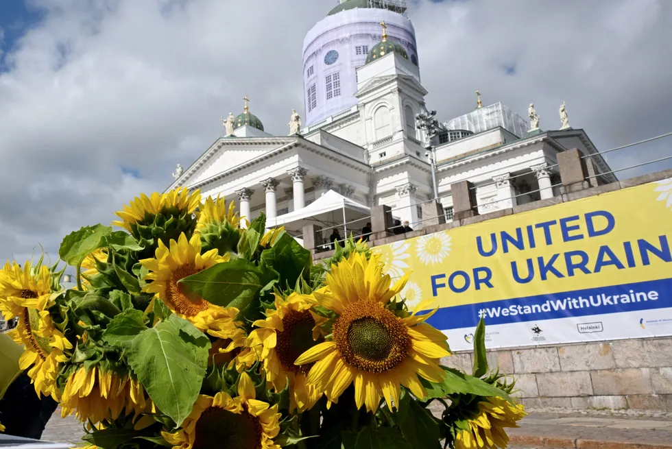 Sunflowers pictured near a banner at the United for Ukraine event, on the country’s Independence Day, at the Senate Square in Helsinki, Finland in August.