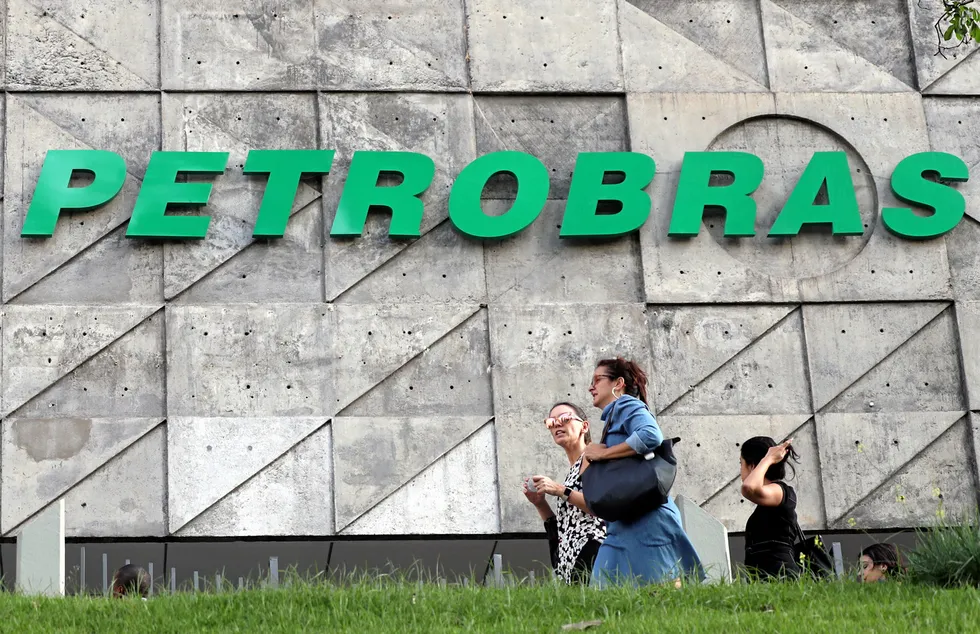 Not for sale: people walk in front of Petrobras headquarters in Rio de Janeiro, Brazil
