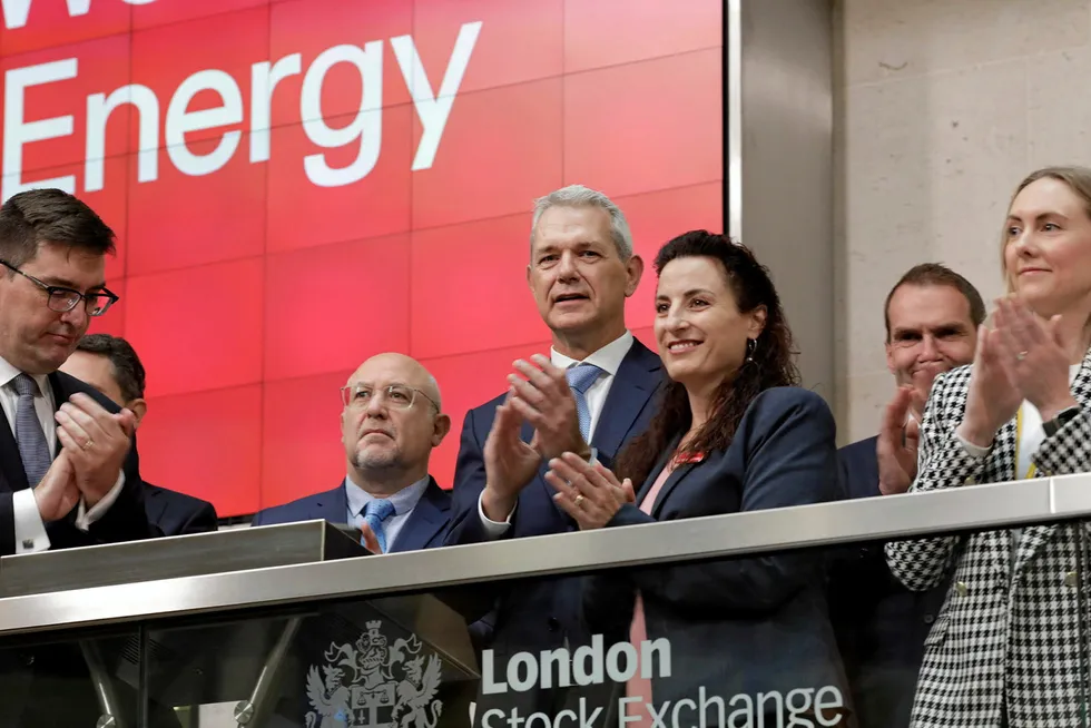 Woodside chief financial officer: Graham Tiver (centre) at the London Stock Exchange