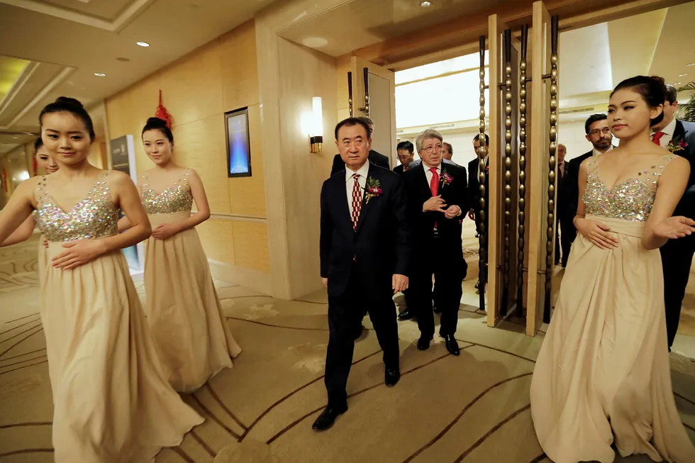 Styreformann Wang Jianlin hos Dalian Wanda Group har foretatt store investeringer over hele verden med minimalt innsyn fra kinesiske tilsyn. Nå er det stopp. Foto: Jason Lee/Reuters/NTB Scanpix