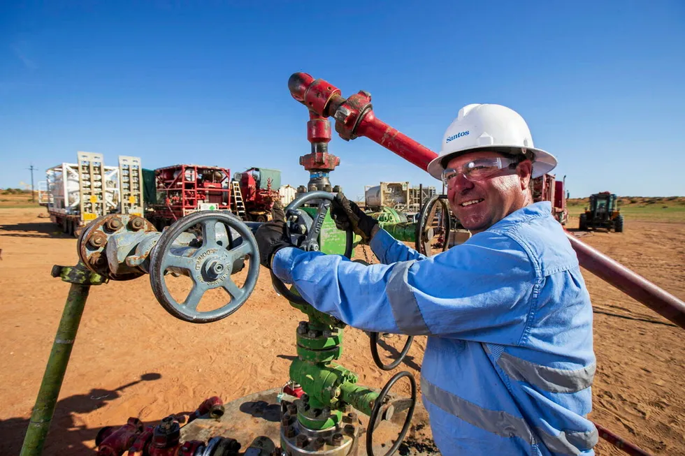 In operation: a Santos worker at Moomba in the Cooper basin, Australia.
