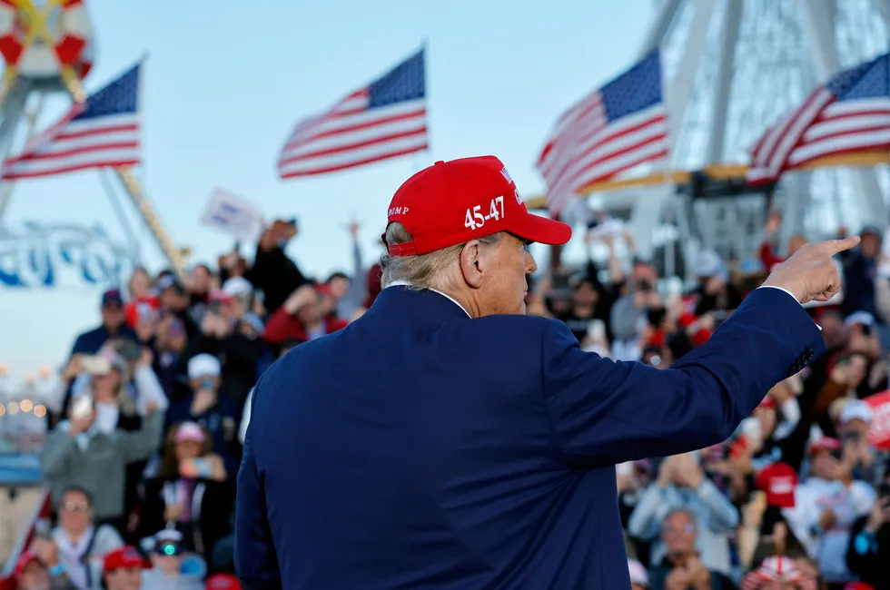 Republican presidential candidate former U.S. President Donald Trump leaves the stage after speaking during a campaign rally in Wildwood Beach on May 11, 2024.
