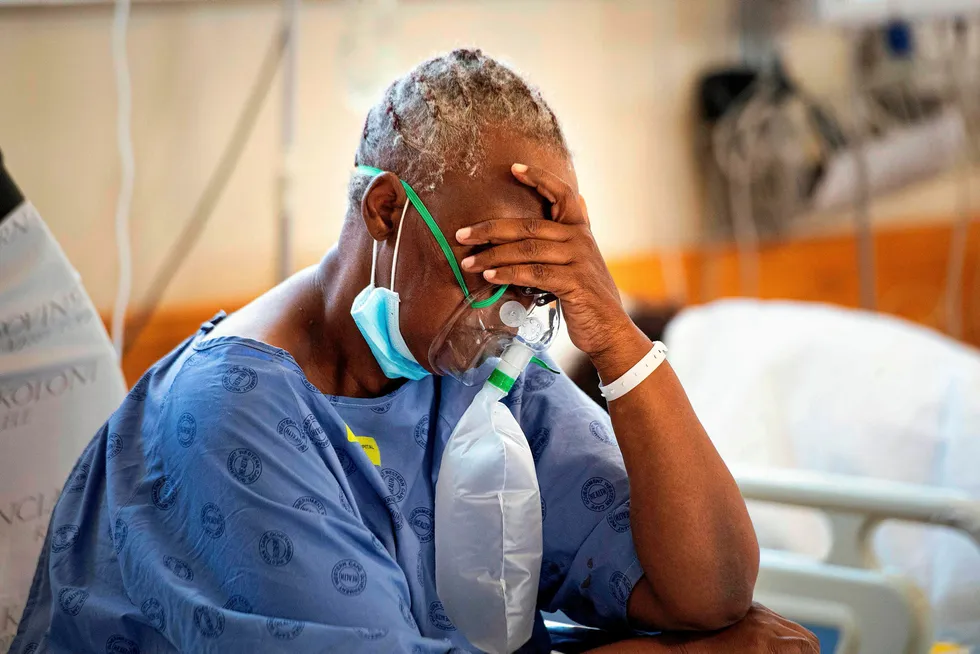 Treatment: a Covid-19 patient breathes in oxygen at a hospital near Cape Town, South Africa