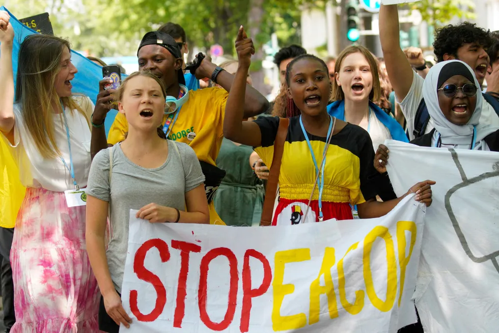 High profile: Swedish climate activist Greta Thunberg (second left) and Ugandan activist Patience Nabukalu (second right) took part in a demonstration against TotalEnergies' EACOP pipeline in Germany this month.