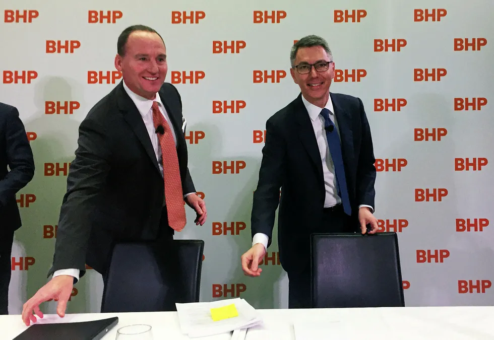 New man: BHP chairman Ken MacKenzie (left) and new chief executive Mike Henry (right)