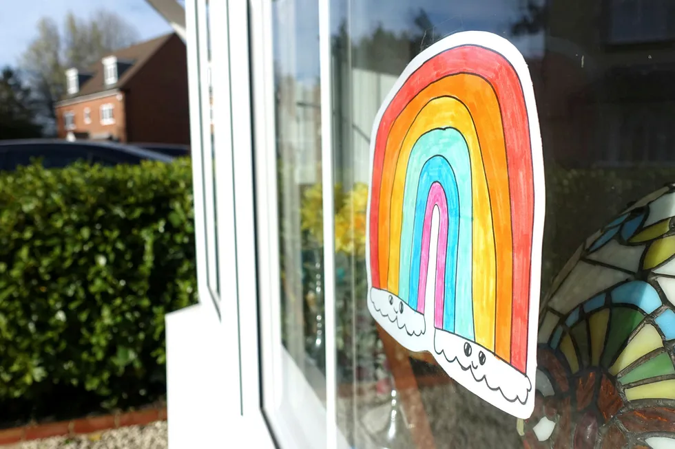 Aiming for brighter times: a picture of a rainbow is seen in a window in East Grinstead, UK as the spread of the coronavirus (Covid-19) continues