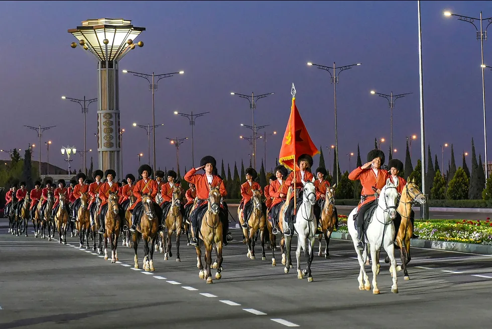 Economic achievements: Soldiers ride their horses during the celebration of the 75th anniversary of the Nazi defeat in World War II in Ashgabat, Turkmenistan where no official Covid-19 cases have been reported since the start of pandemic