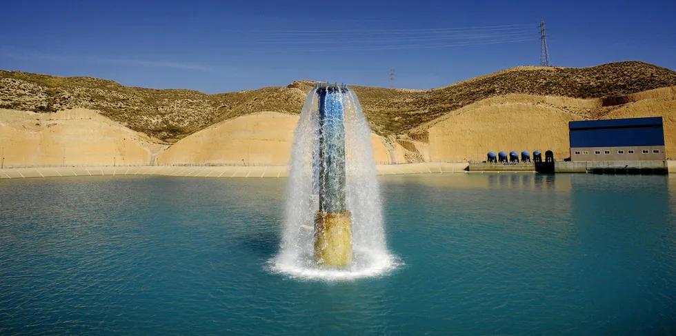 Fresh water is pumped into a reservoir after being treated at a desalination plant in southern Spain.