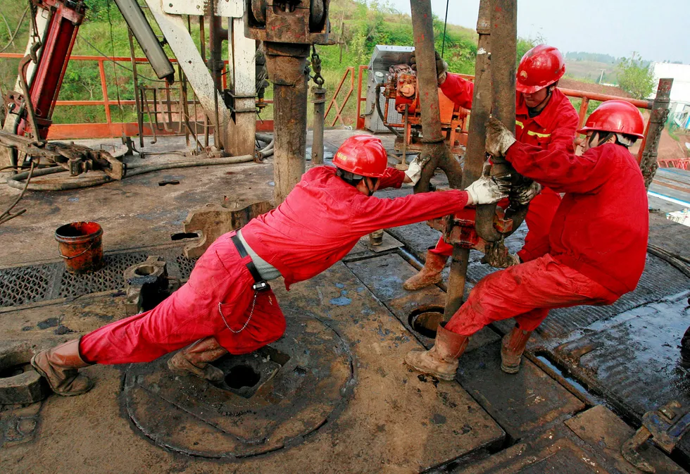 In action: workers at a PetroChina operation in China's Sichuan province