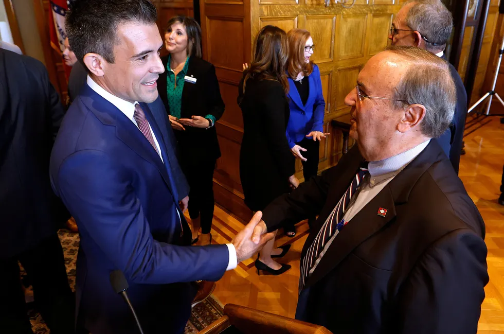 New venture: Patrick Howarth, ExxonMobil’s lithium business manager (left) shakes hands with Arkansas Senator Mark Johnson after the announcement of plans for the first lithium well to be drilled in the state.